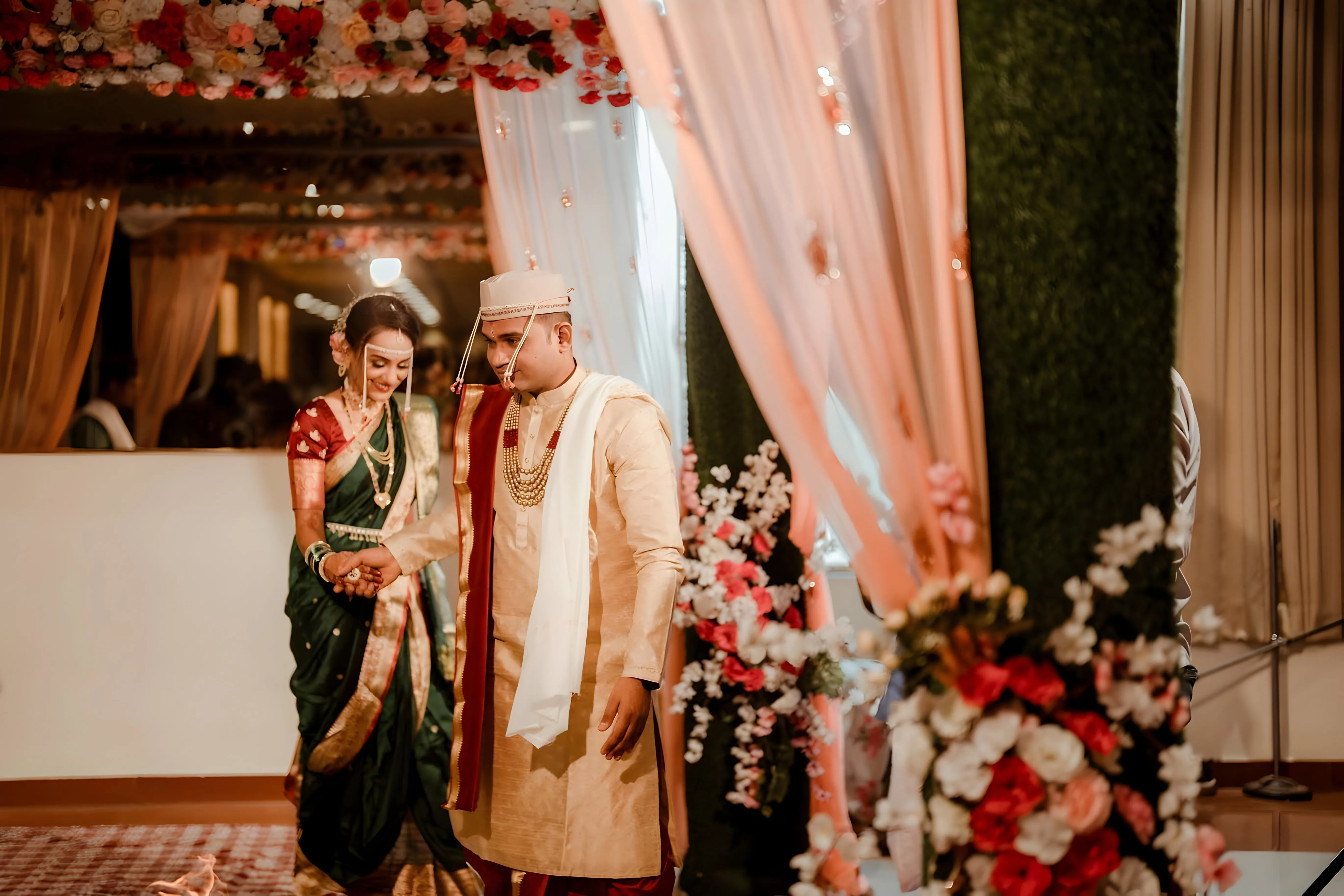Beautiful woman in a long red dress walks around the city with her husband